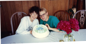 My brother and me in our '80's hair and glasses.